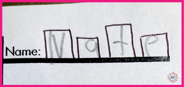 Providing visual boundaries of individual letter boxes for a student to write their name will support spatial organization.