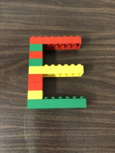 Use different bricks and blocks to build letters