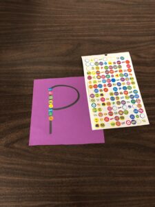 Place stickers over letters