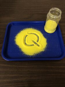 Sand and salt trays to practice letters