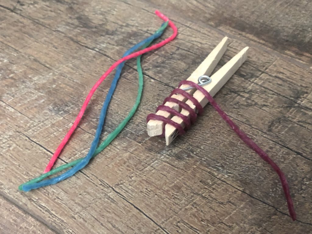 Use wikki stix and clothespins to target tactile processing, fine motor development, and bilateral coordination.