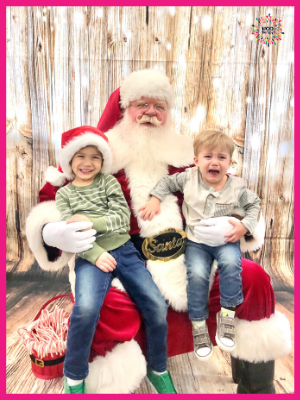 Classic Santa picture...one kid loving it, the other one screaming his head off.