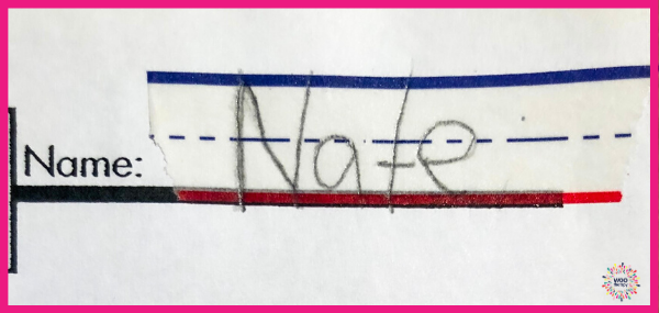 WooTape placed at the top of student worksheets with the name Nate written