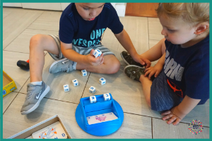 Boggle Jr. is great for lots of fine motor manipulation and one of my top games for handwriting practice of uppercase letters.