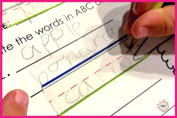 Use of visual boundaries for Kinder/1st grade students is necessary.  WooTape 3 can provide tri-colored lines to help differentiate the headline, midline, and baseline.